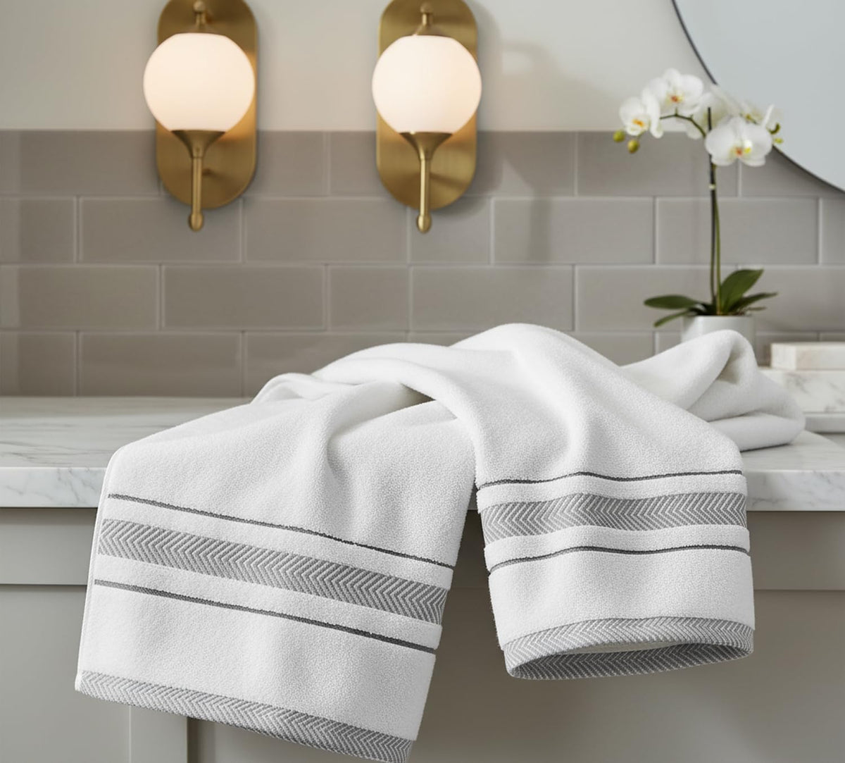 Le fil blanc washcloths neatly stacked for guest rooms