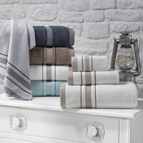 Le fil blanc white and grey stripe towels draped over rack