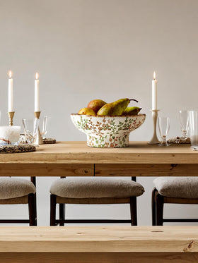 LE TAUCI ceramic potpourri bowl serves as aromatic centerpiece.