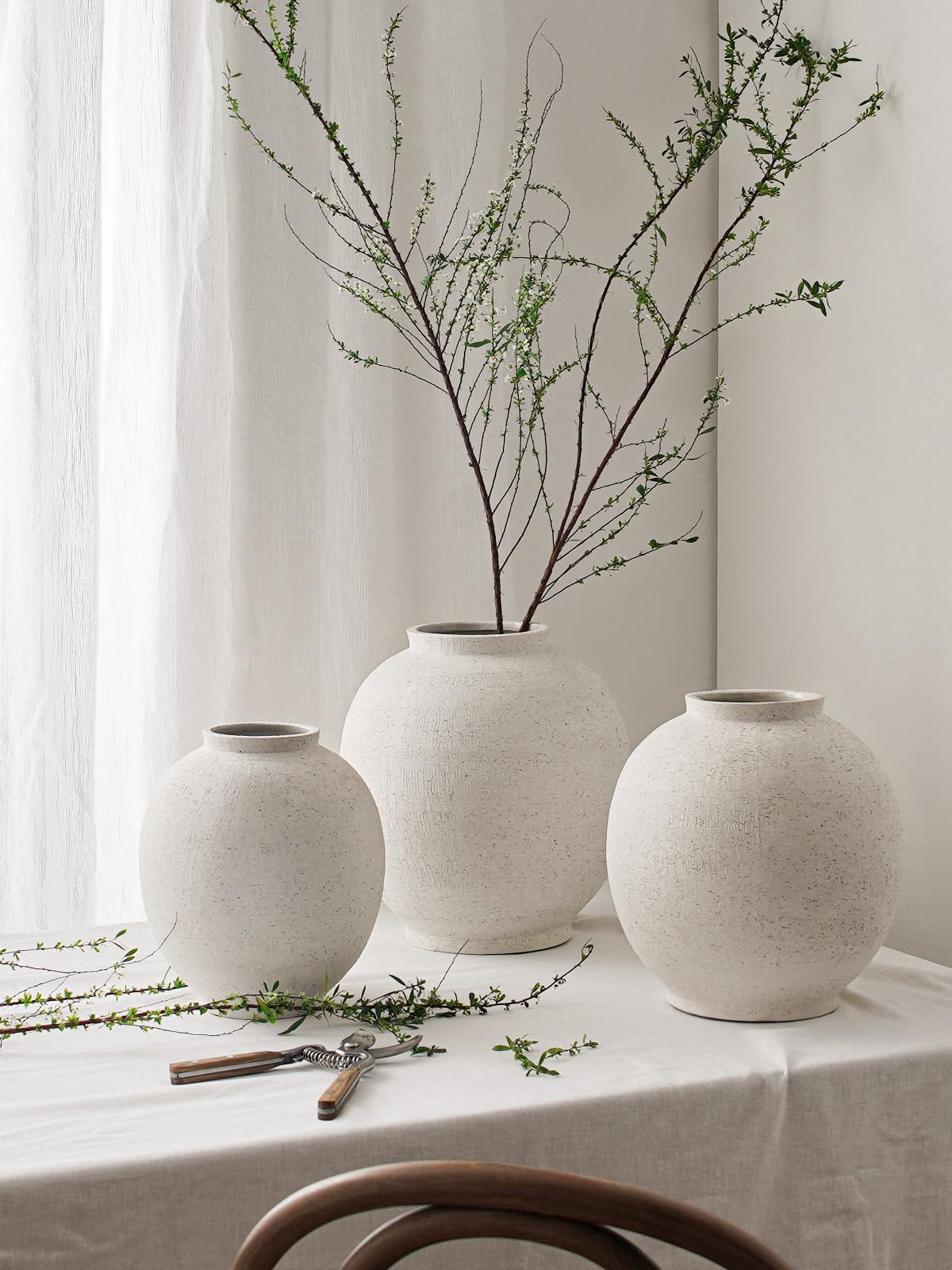 Le Tauci Garden indoor-outdoor ceramic vase provides sturdy, versatile decor indoors or outdoors.