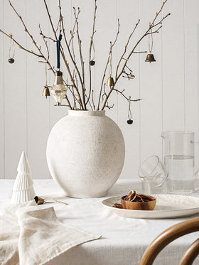Le Tauci Garden natural clay texture vase adds rustic handmade charm.