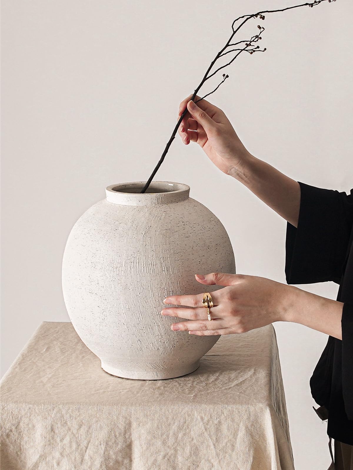 Le Tauci Garden rustic farmhouse vase complements mantel decor.