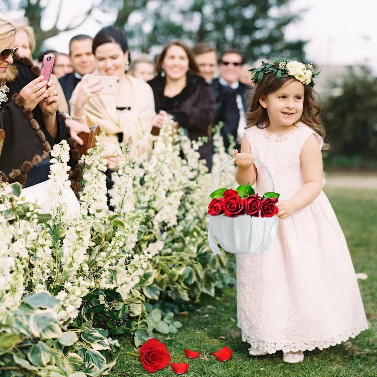 Lebsitey flower basket filled with petals to create a warm, romantic aisle atmosphere.