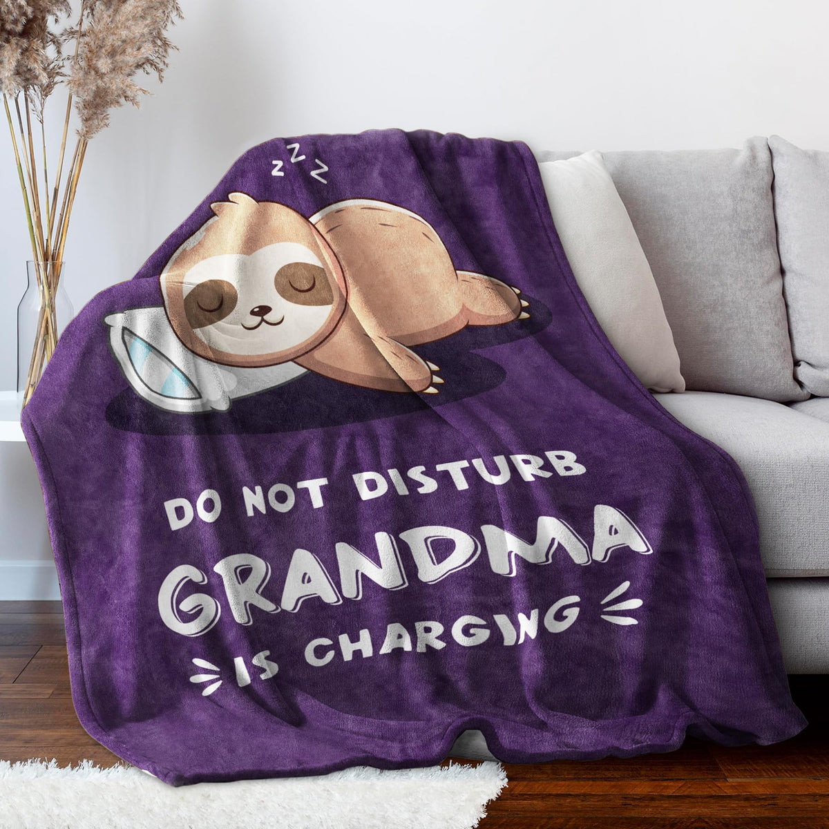 Leebbsin grandma sloth blanket folded, ready for gifting