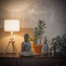 Leekung Buddha statue decor for bookshelf or windowsill promotes calm mindfulness.
