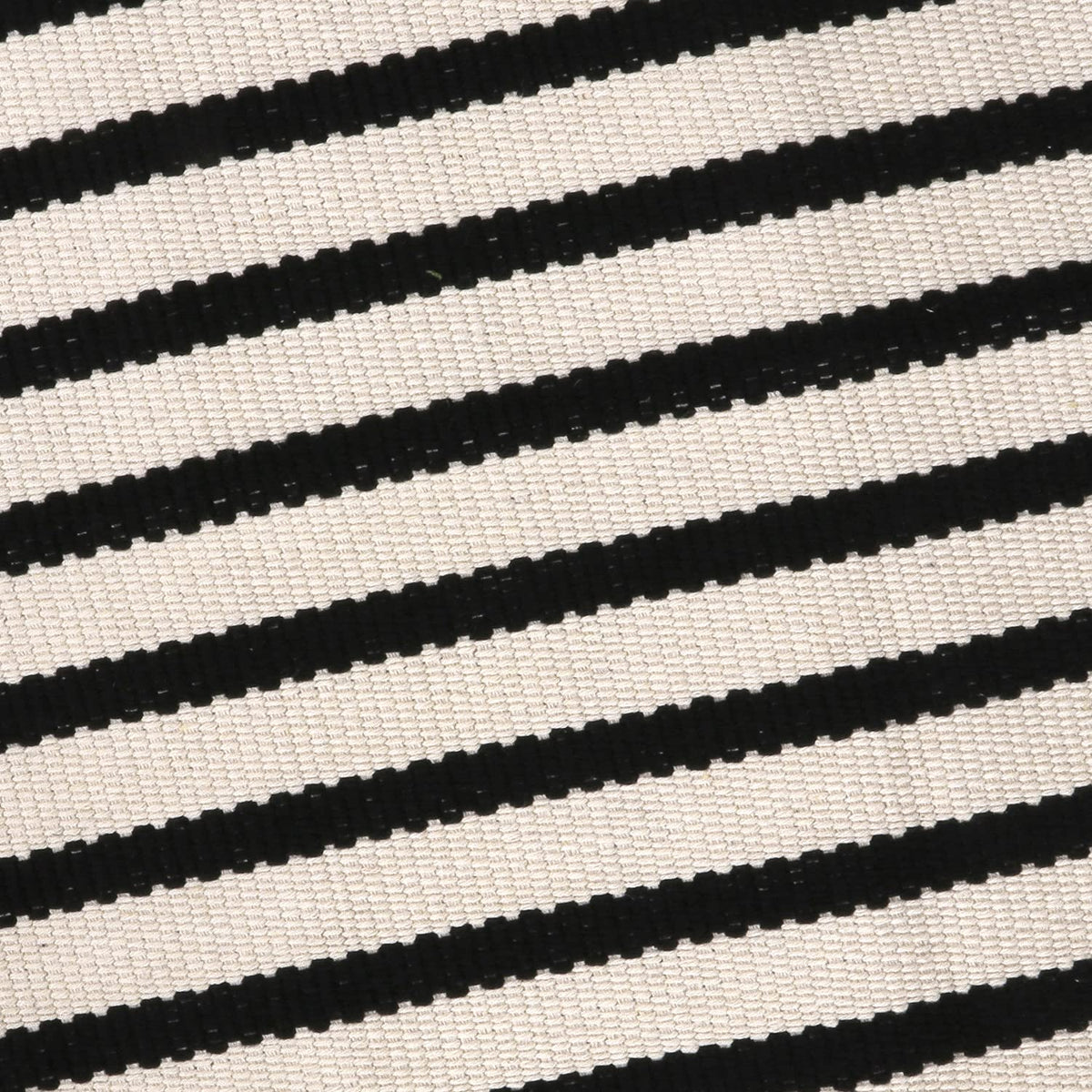 LEEVAN rug lacks rubber backing; pair with a rug pad for grip.