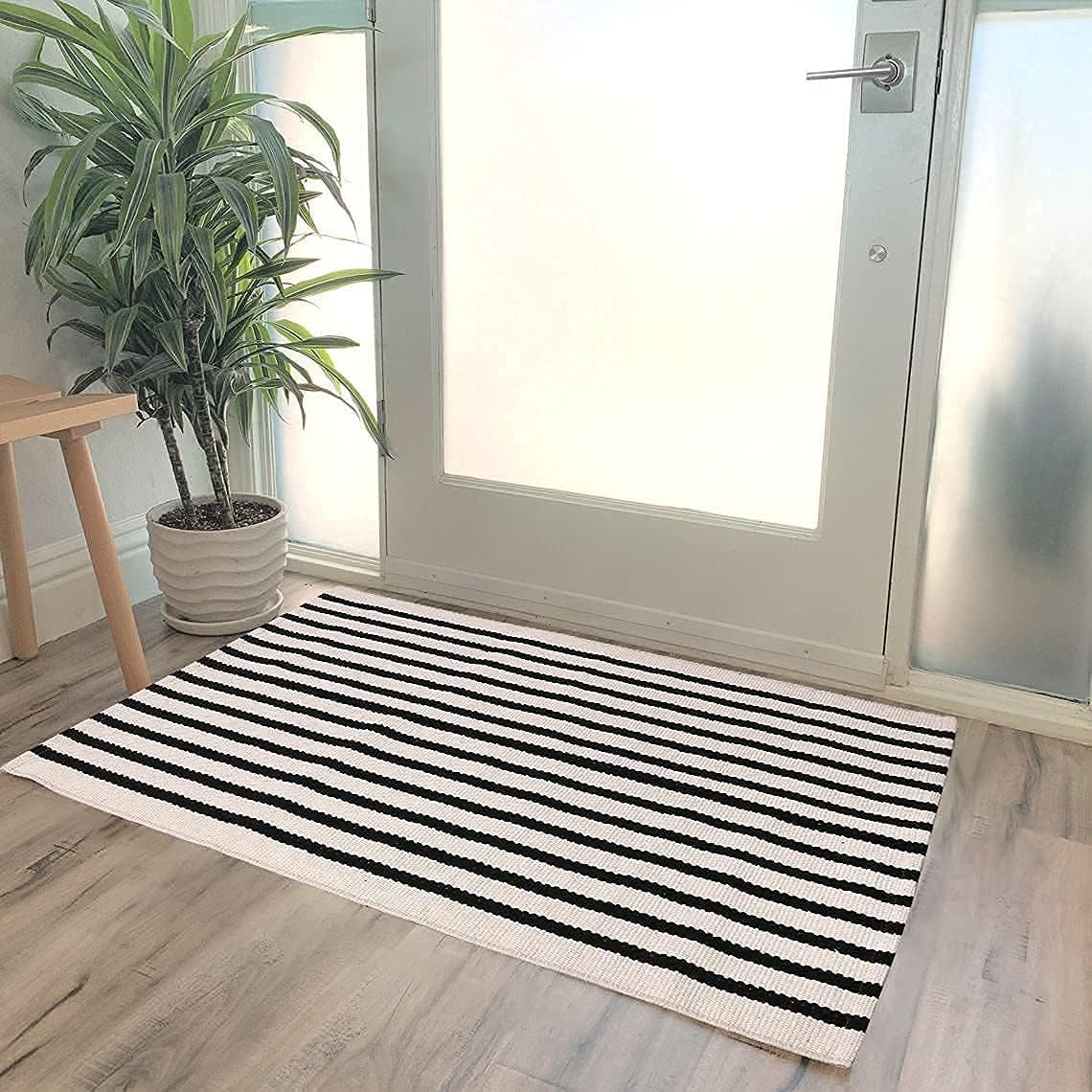 LEEVAN striped rug close-up reveals durable weave for high-traffic entryways.