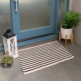 LEEVAN striped rug versatile for entryways, porches, and bathrooms.