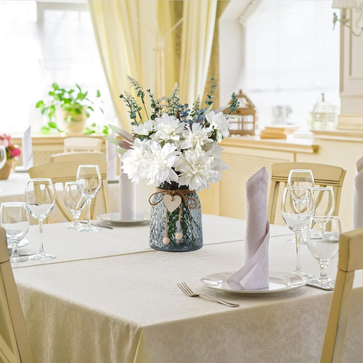 Leftover artificial stems are bendable for customizable DIY arrangements.
