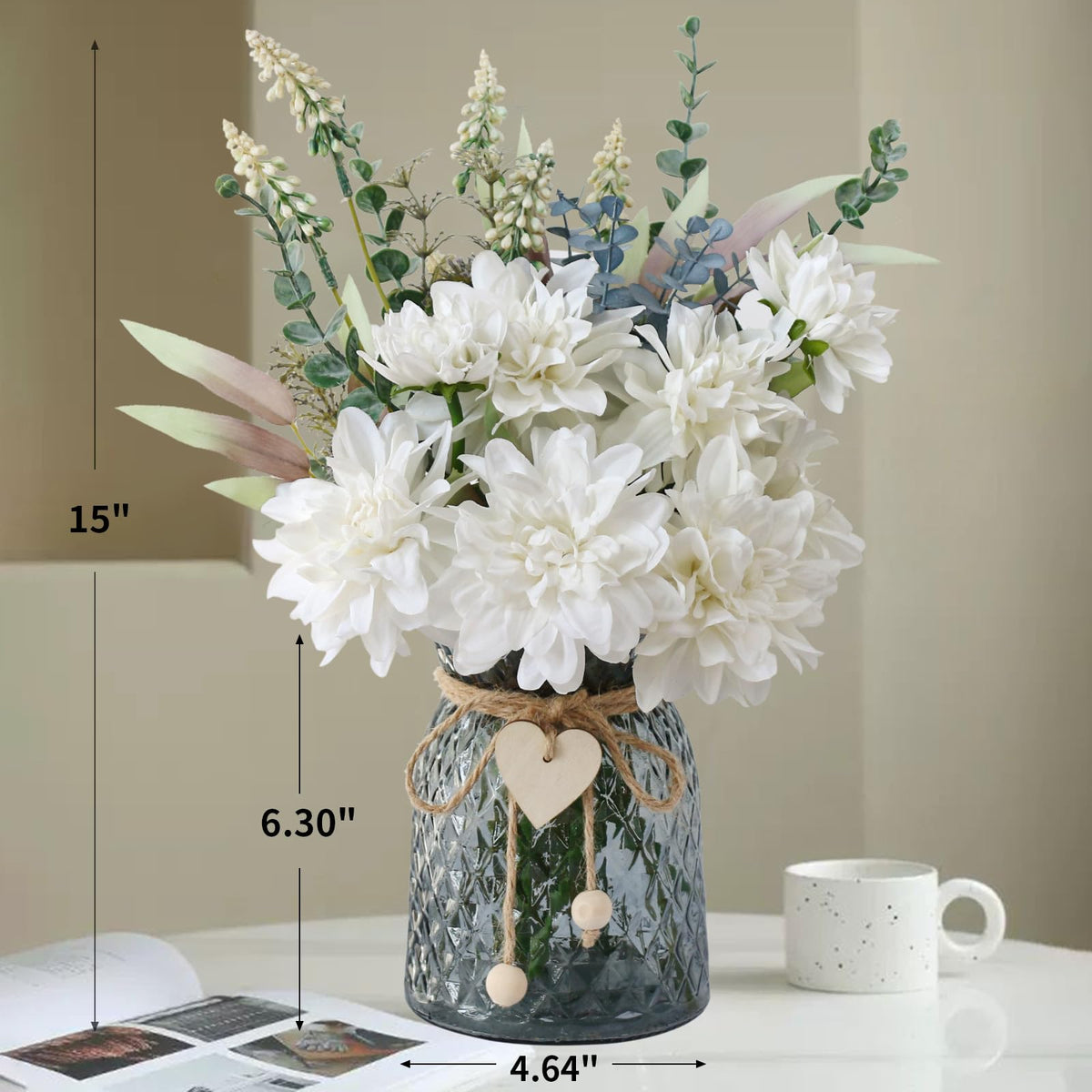 Leftover fake flowers in vase with eucalyptus stems for easy, maintenance-free decor.