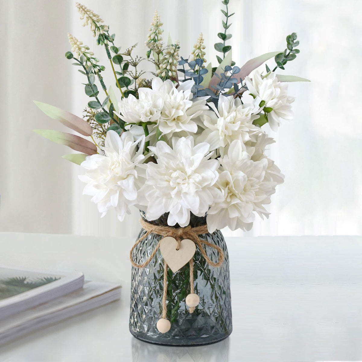 Leftover fake flowers in vase—white dahlias create a long-lasting table centerpiece.