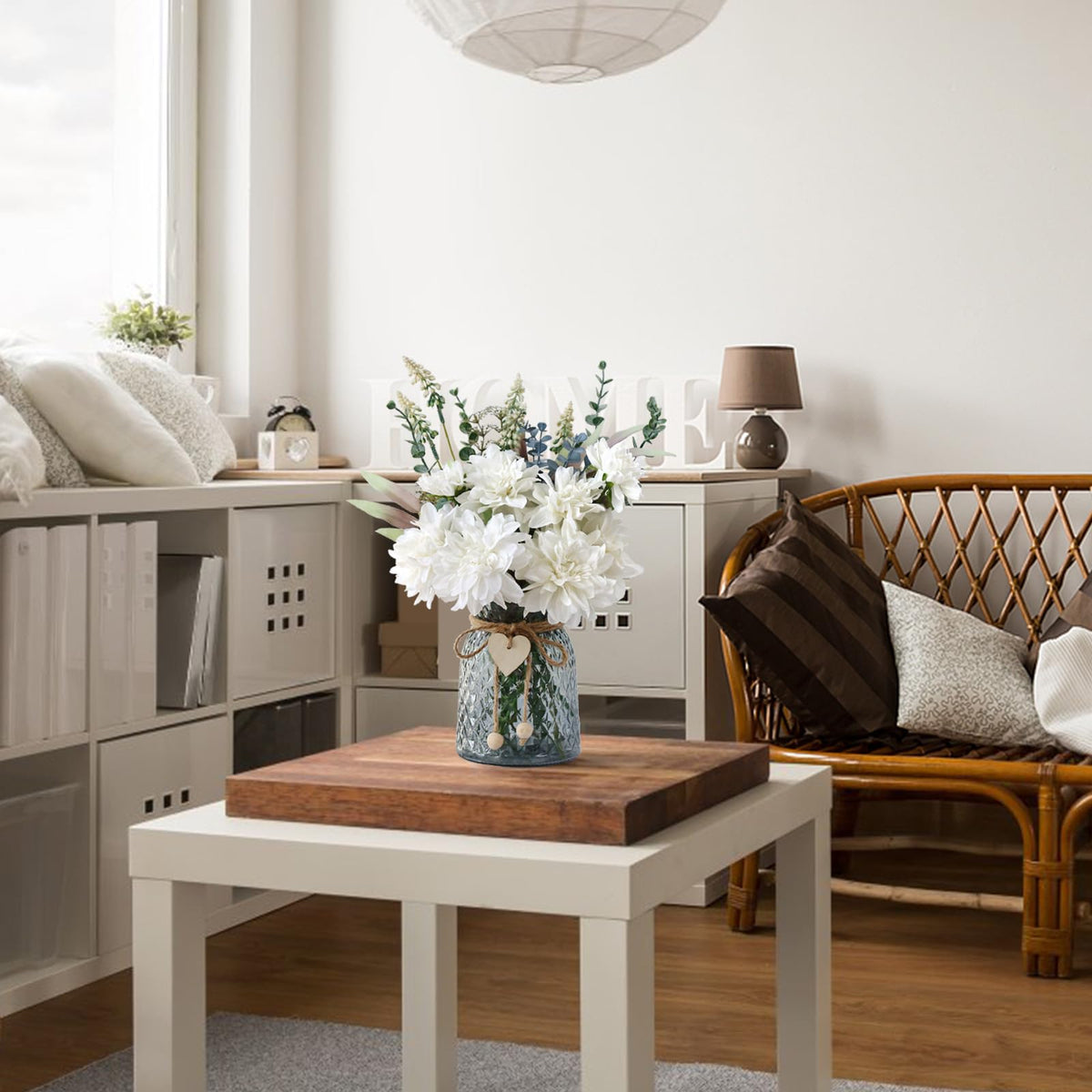 Leftover silk flowers in vase for bedroom decor with timeless appeal.
