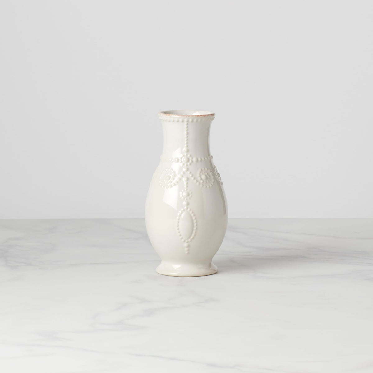 Lenox French Perle vase showcasing roses beautifully, adding refined charm to any room.