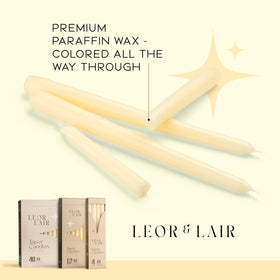 Restaurant dining ambiance enhanced by Leor & Lair ivory taper candles.