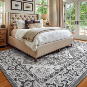 Lessymo rug grayscale border detail adds versatile sophistication for any seating area.