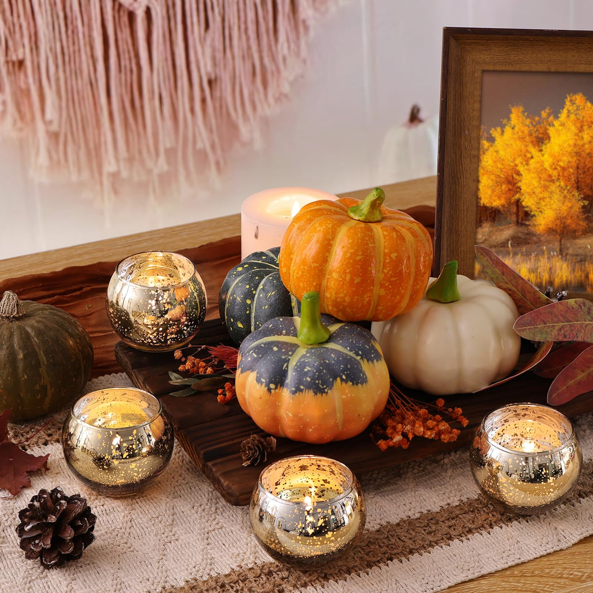 Letine votive holder showcases reflective gold mercury glass for elegant decor