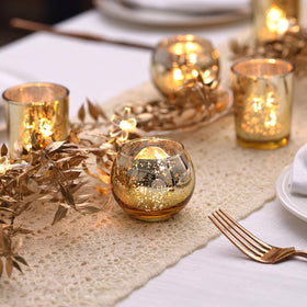 Letine votive holder gleams under candlelight for romantic outdoor events