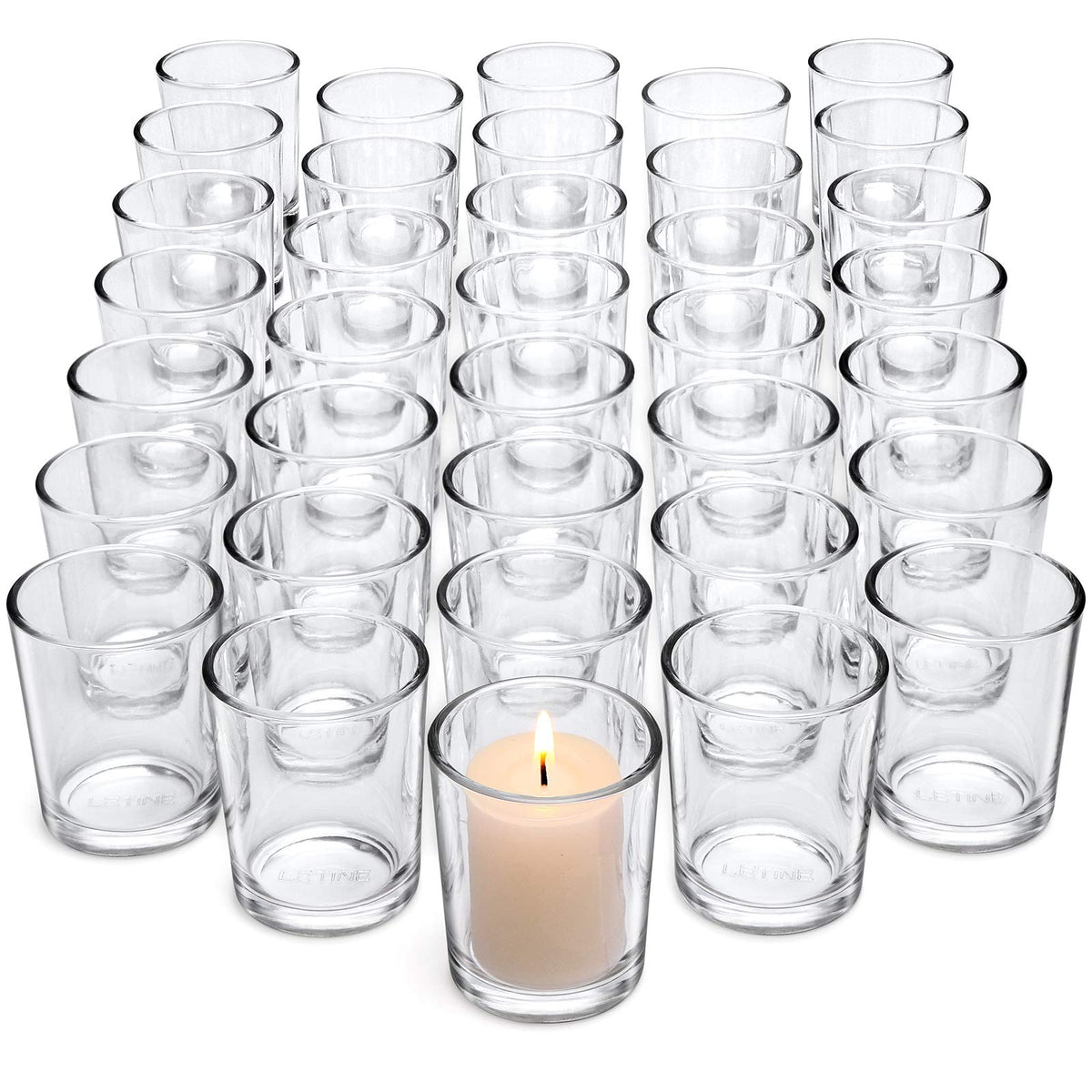Letine votive holders in clear glass for tea lights, ideal for romantic table settings.