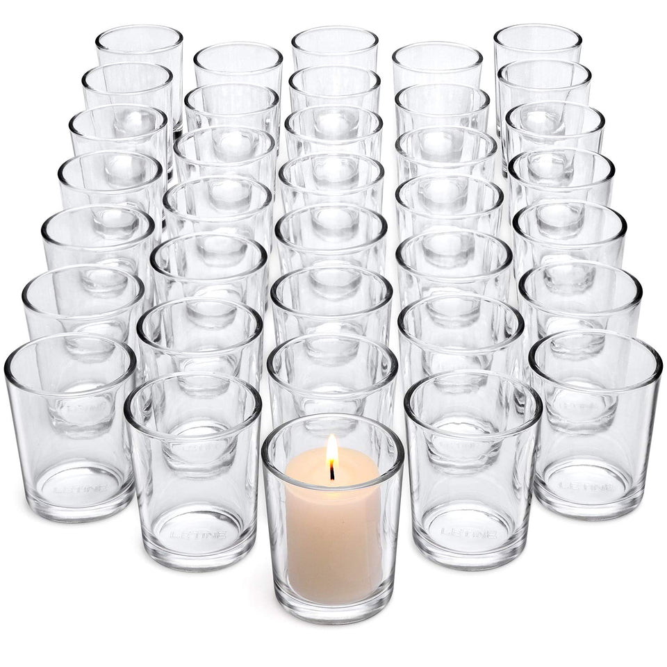 Letine votive holders in clear glass for tea lights, ideal for romantic table settings.