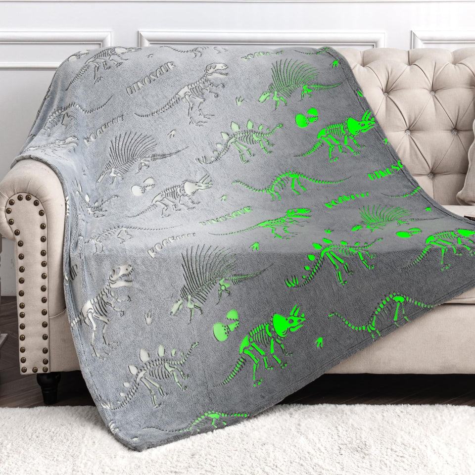 Levens Dinosaur World blanket glows in the dark for nighttime magic and comfort