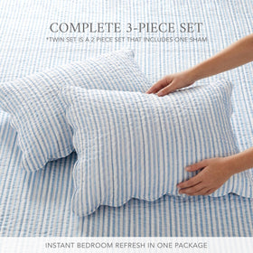 Close-up shows cotton texture and quality stitching on Martha Stripe quilt.