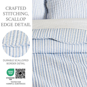 Folded Martha Stripe quilt highlights reversible design and bound edge.