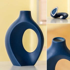 Levvohd Snuggle Hollow vases displayed on a dining table for Nordic coastal vibe.