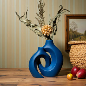Levvohd Snuggle Hollow with pampas grass styling on a console table.