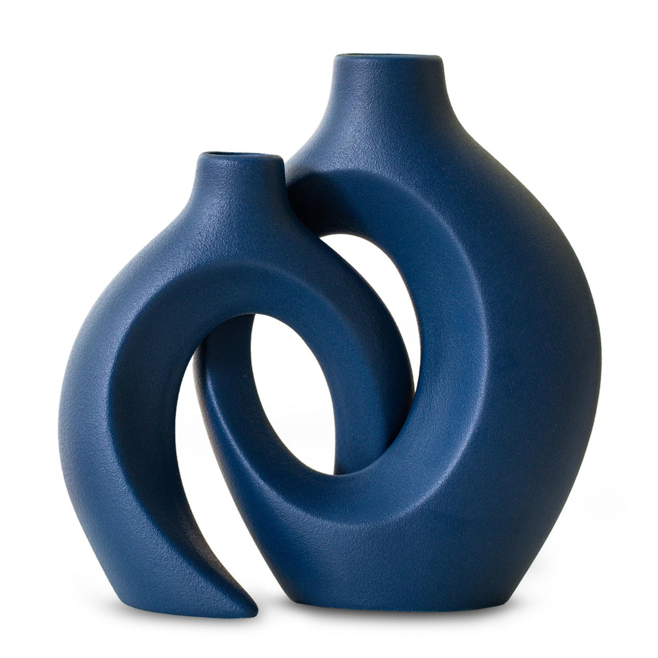 Levvohd Snuggle Hollow vase front view with matte navy blue finish for modern home decor.
