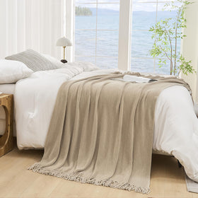 Lifein knit chenille blanket on bed with soft, silky touch