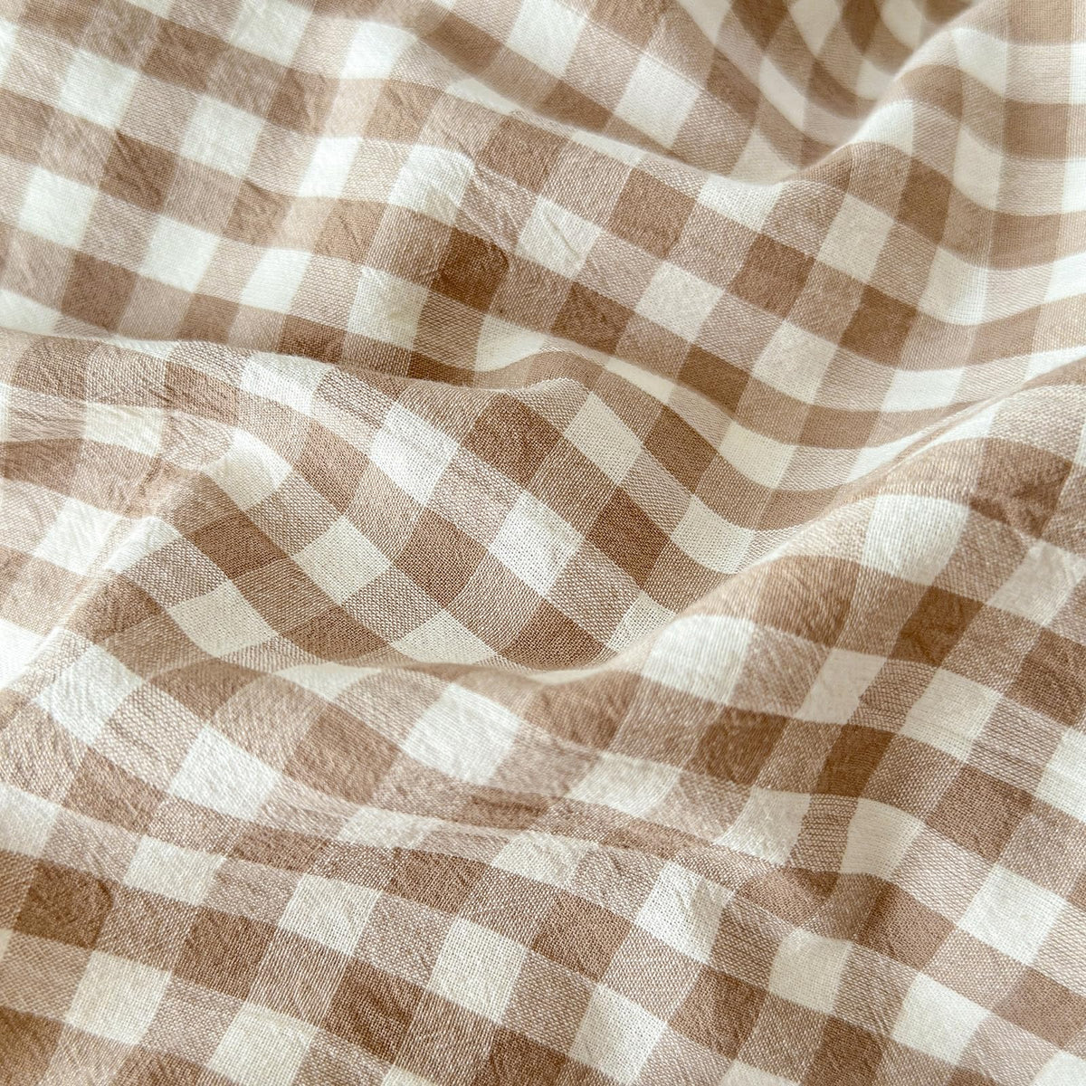 LifeTB gingham bedding displays a crinkled finish with rustic charm.