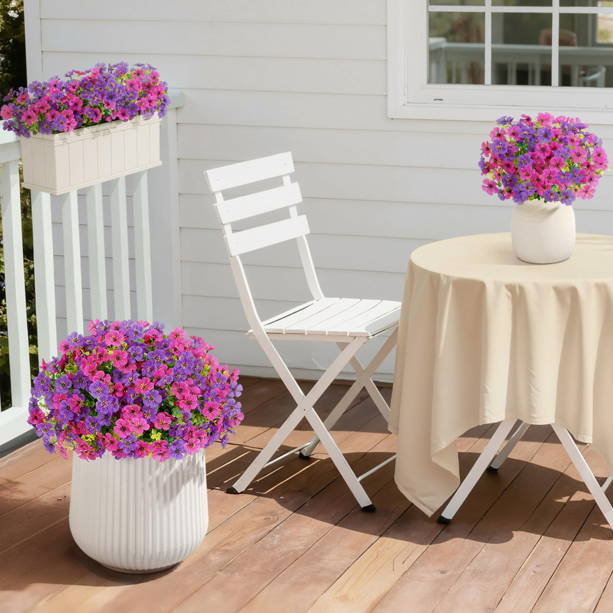 Lifewit fuchsia and purple daisies brighten weddings or events without upkeep.