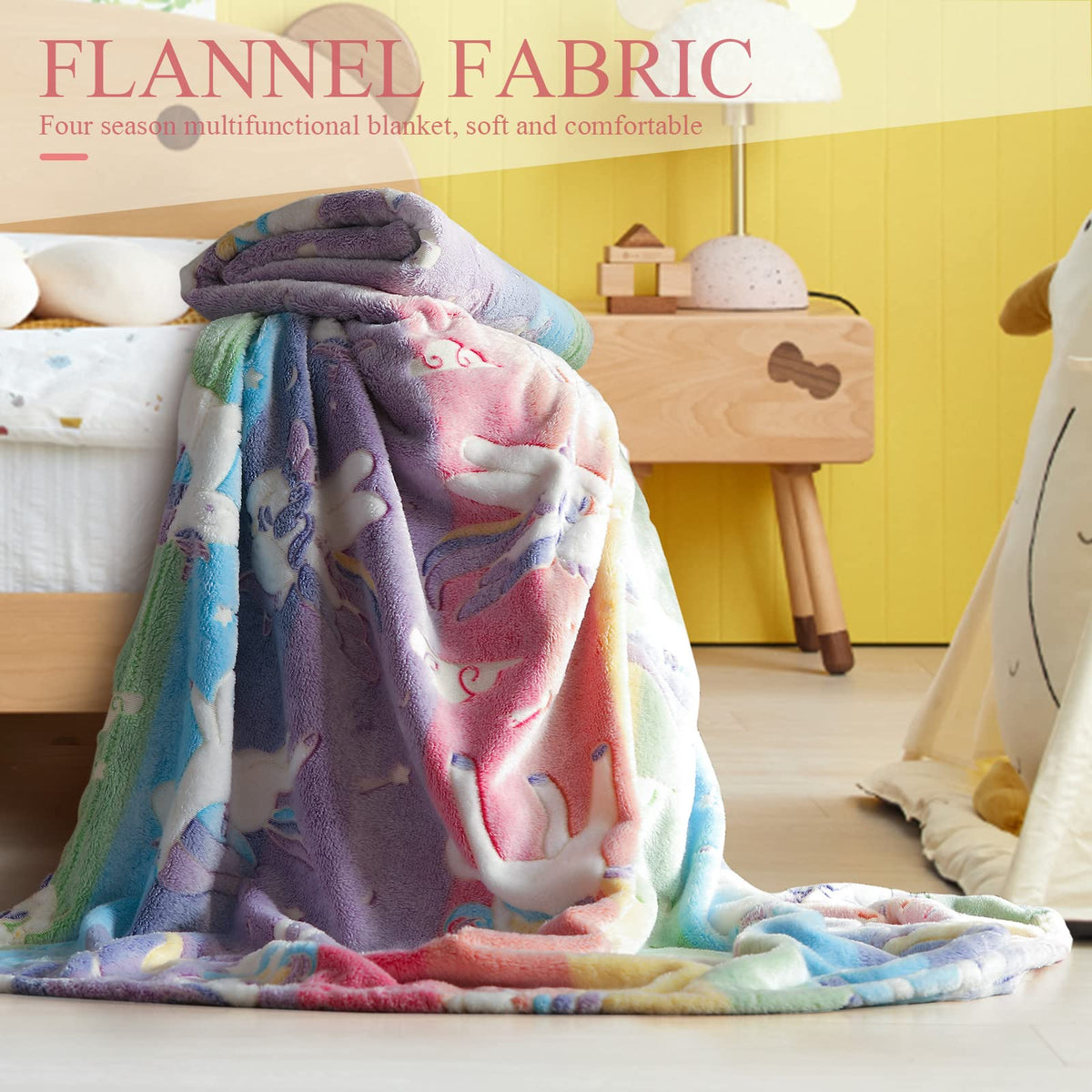 LIFEYJ unicorn-design blanket glows after light exposure for bedtime.