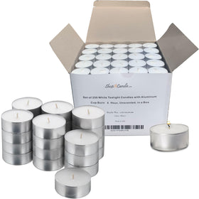 Light In The Dark tea light candle in a metal cup delivers a steady 6-hour glow.