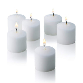 Light In The Dark white votive candles in a box, ideal for bulk event decor.