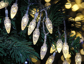 Bendable branches of Lightshare tree being shaped for setup
