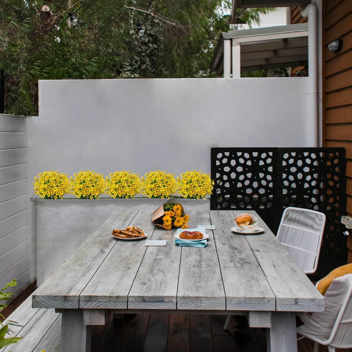 LikSoor fake greenery yellow flowers brighten window boxes with easy maintenance.