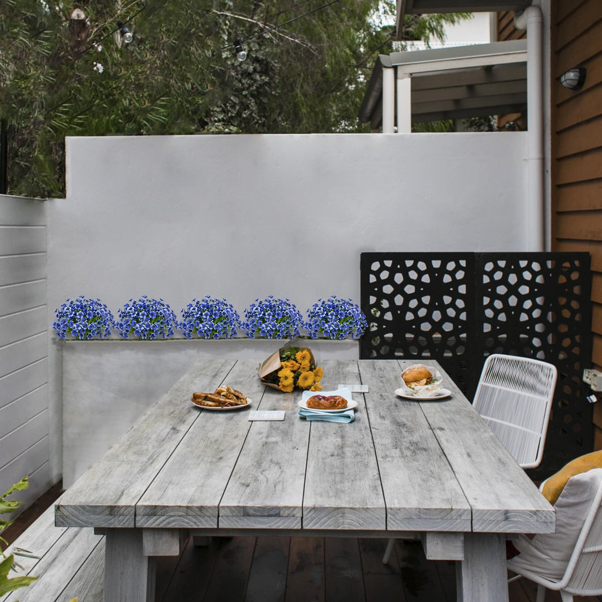 LikSoor blue faux greenery boosts garden decor with durable, weather-ready design.