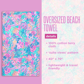 Lilly Pulitzer Splendor in the Sand pattern highlights a vivid floral design at poolside
