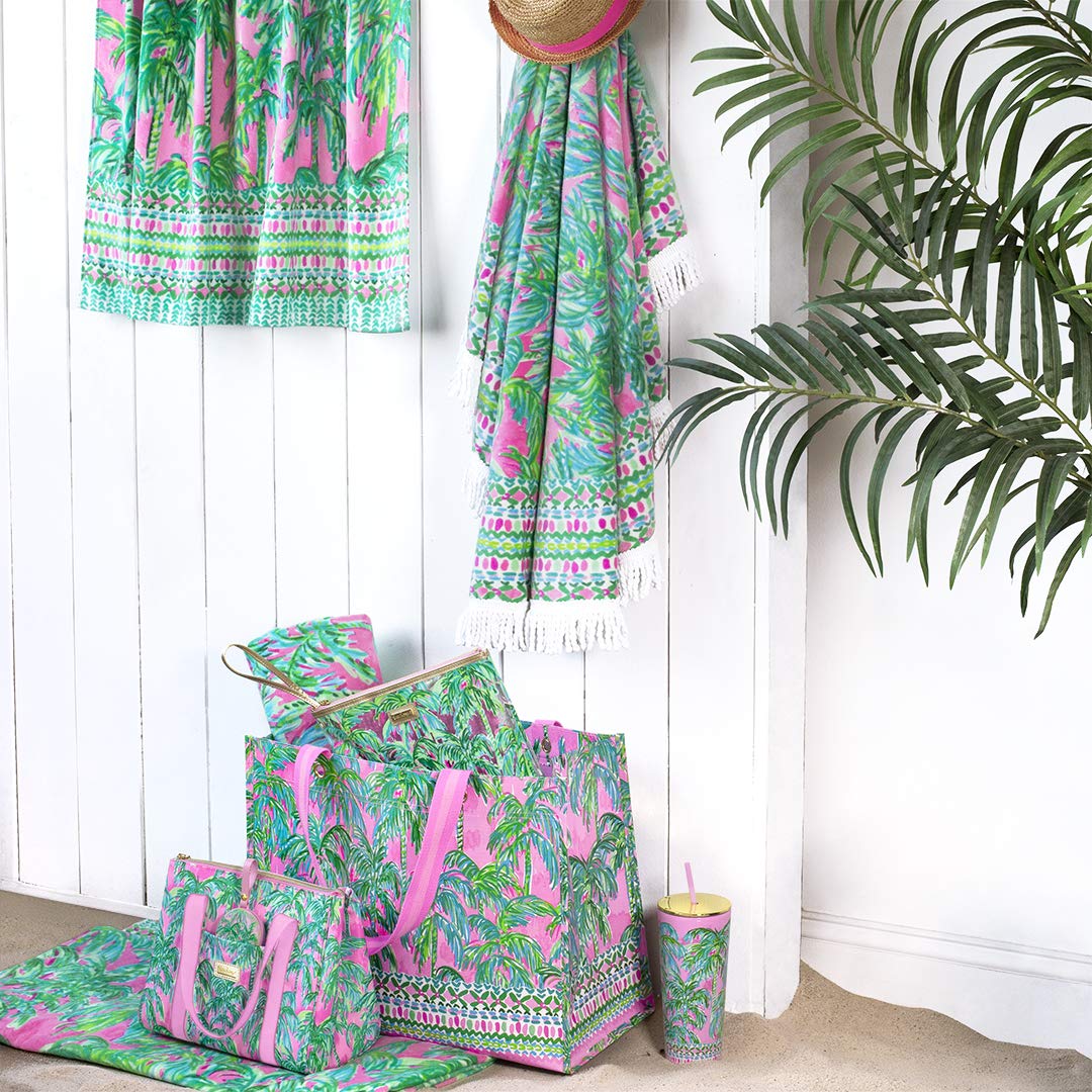 Beach setup featuring Lilly Pulitzer towel for stylish lounging.