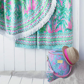 Soft cotton terry of Lilly Pulitzer towel for plush comfort after sun.