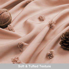 LilyCat textured tassel puffs add a playful rustic accent to your bath.