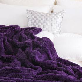 Linecooo Deep Purple fleece throw closeup 3D checkered texture.