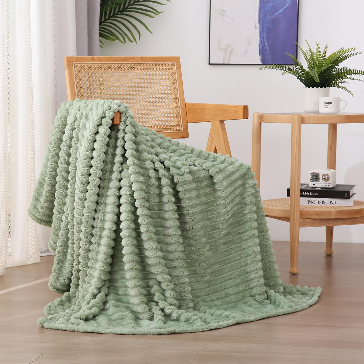 Linecooo Sage Green fleece throw 60x80 on couch for cozy evenings