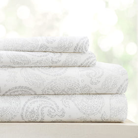 Linen Market 4 Piece Queen Sheet Set in gray floral on bed for cooling, ultra-soft sleep