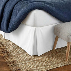 Linen Market bed skirt with 14-inch drop provides full floor-to-mattress coverage.