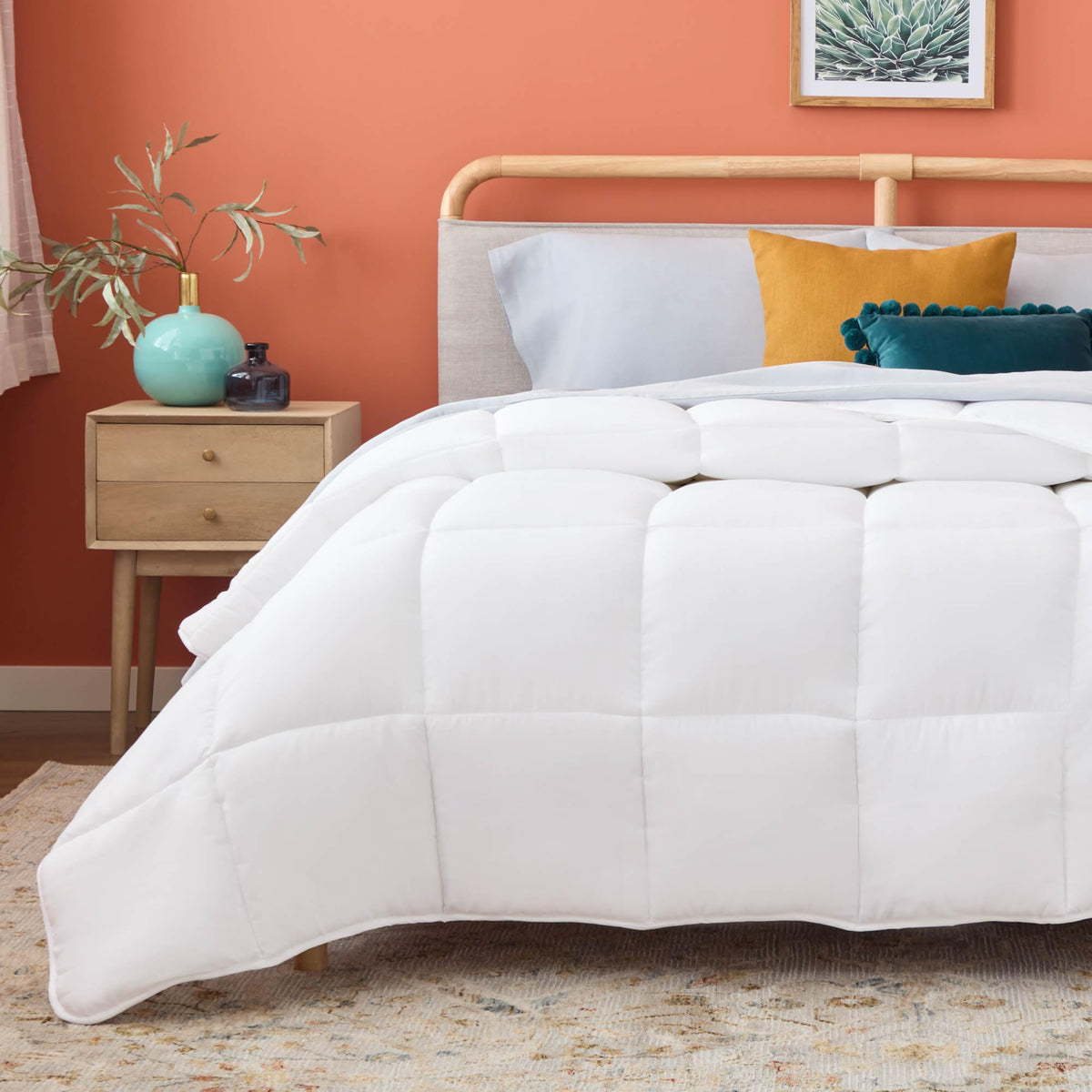 Linenspa white-down-alternative comforter with box-stitch design for even warmth and secure fill.