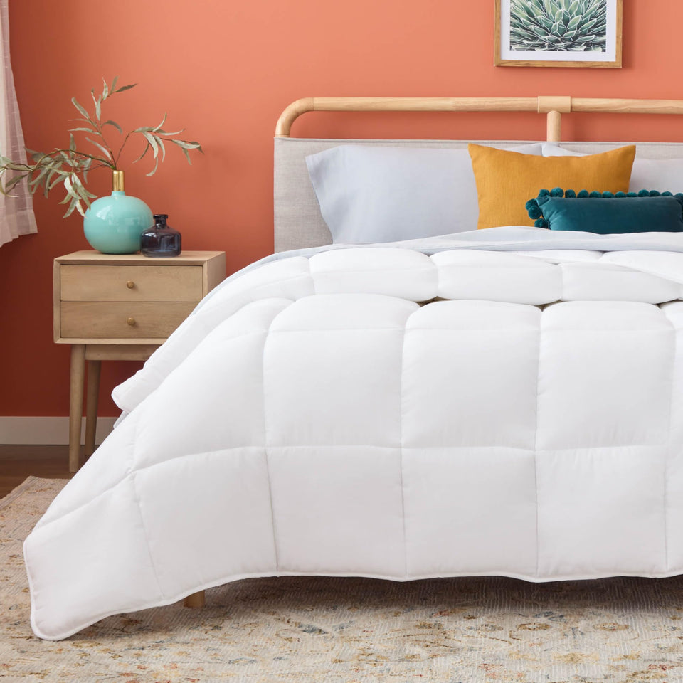 Linenspa white-down-alternative comforter with box-stitch design for even warmth and secure fill.