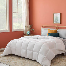 Linenspa white down-alternative comforter close-up showing plush, year-round softness.