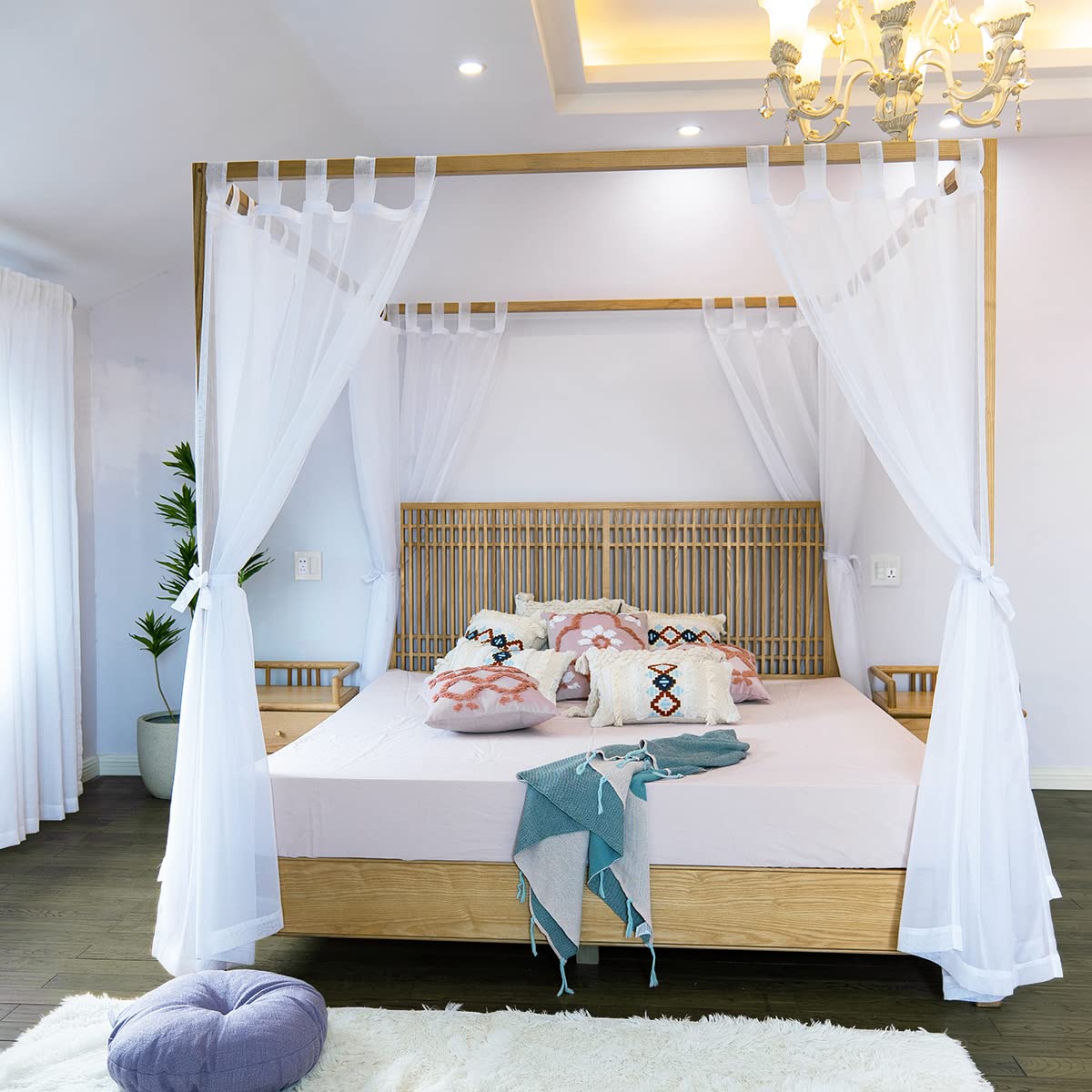 Linentalks sheer canopy curtains for king bed provide airy, romantic ambience.